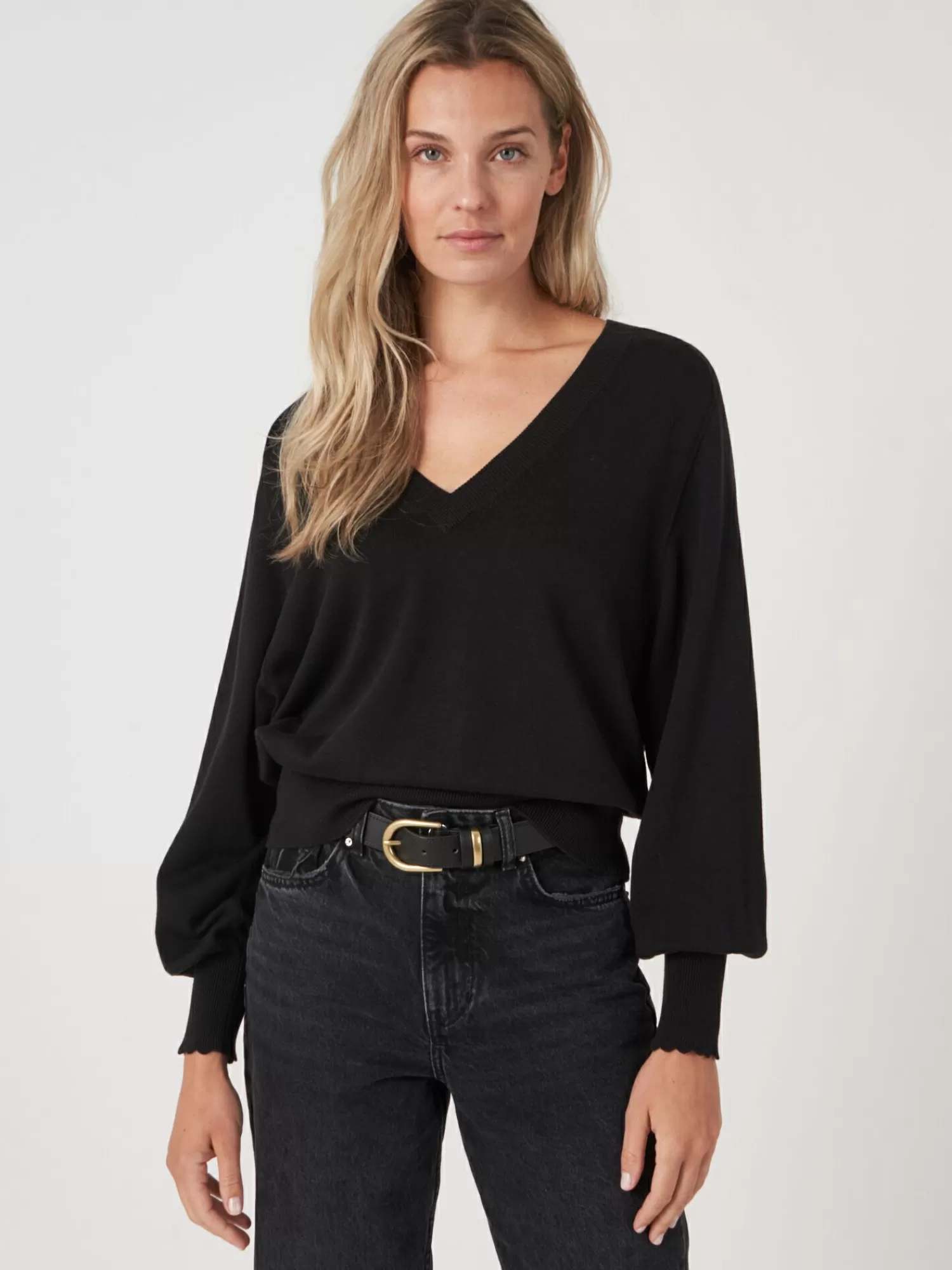 Pull féminin décolleté en V profond avec manches ballon montées - Style décontracté et tendance pour femme