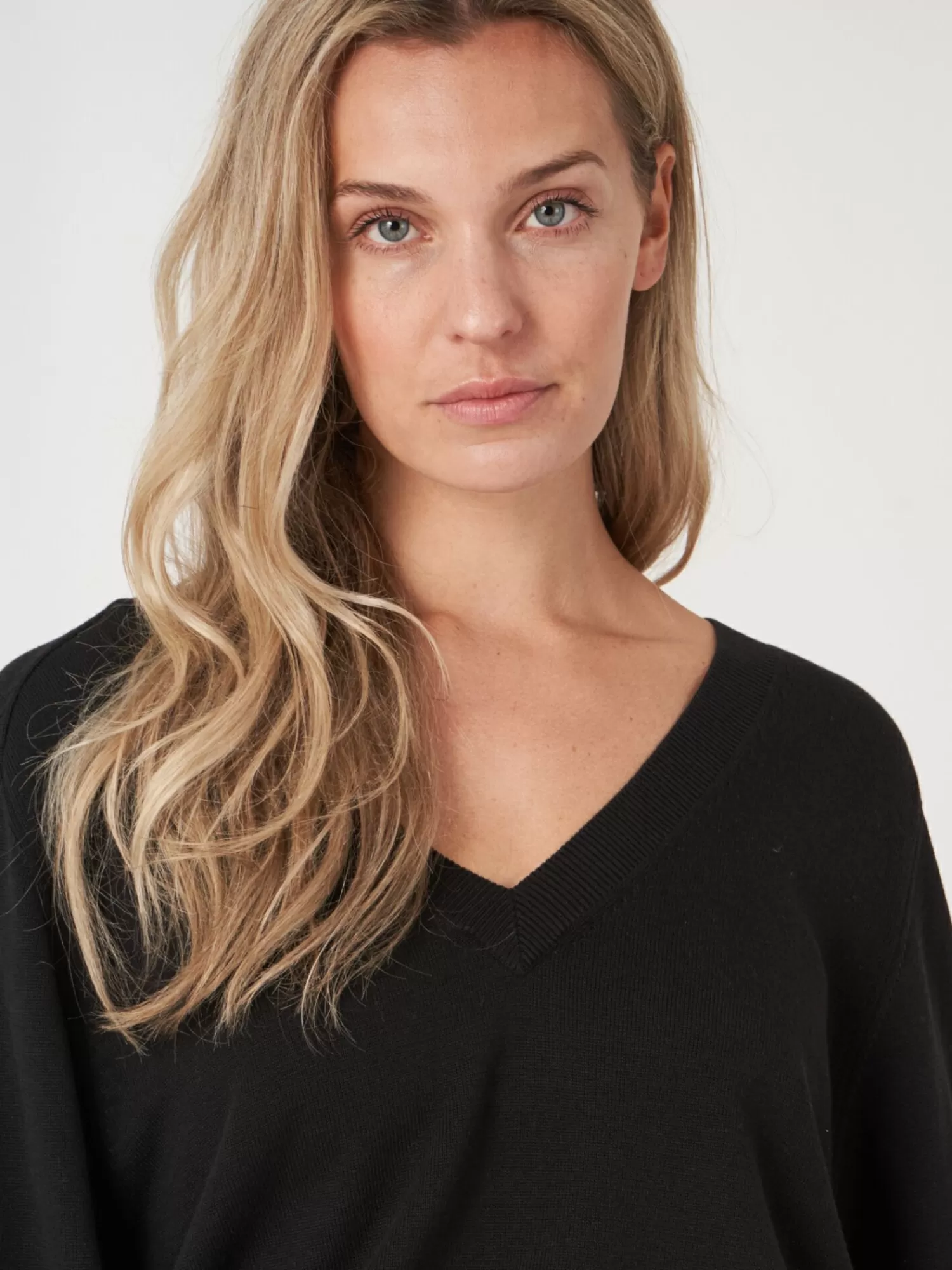 Pull féminin décolleté en V profond avec manches ballon montées - Style décontracté et tendance pour femme
