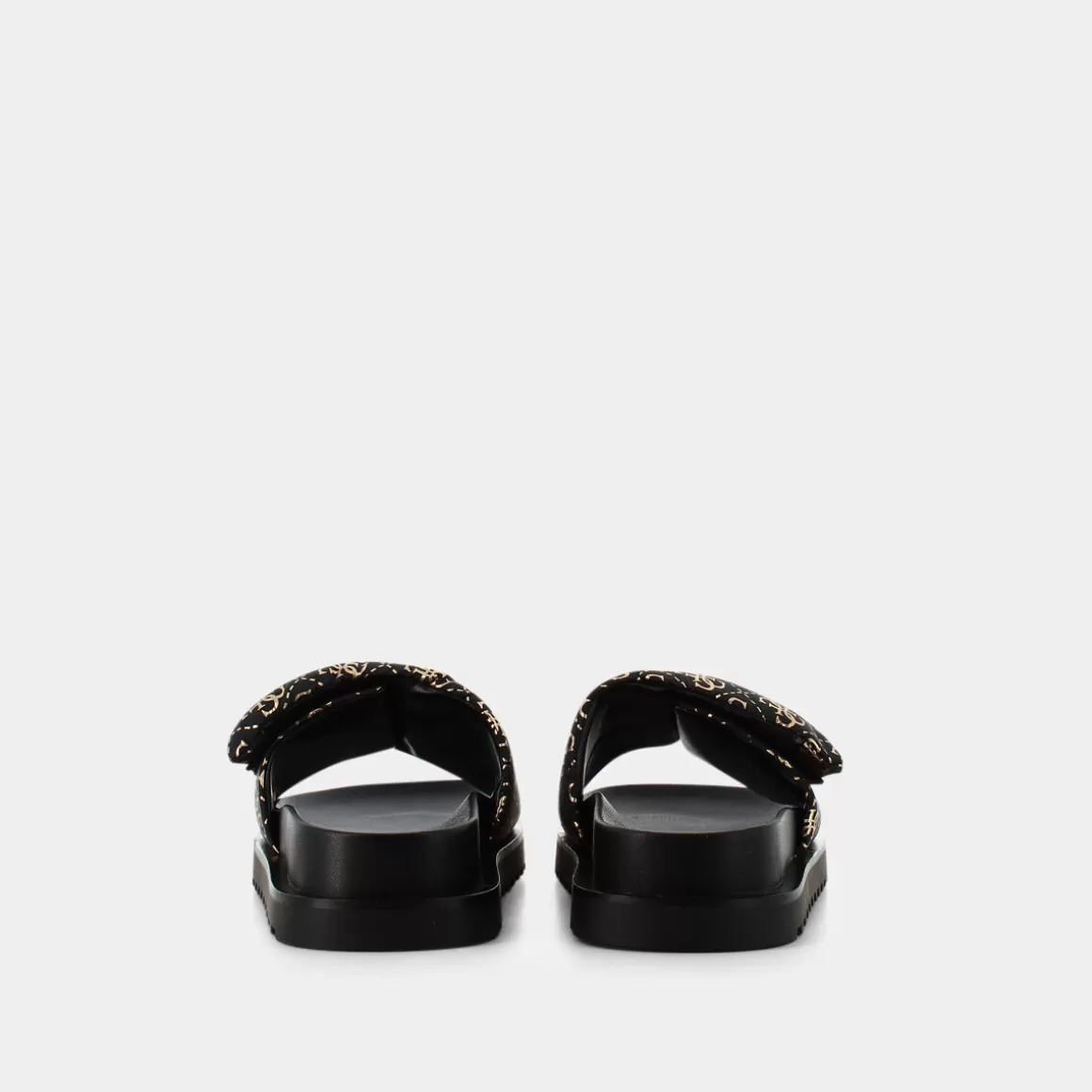 Sandales GUESS en cuir noir verni - Modèle automne avec détails métallisés argentés | Promotion exclusive sur la collection élégante