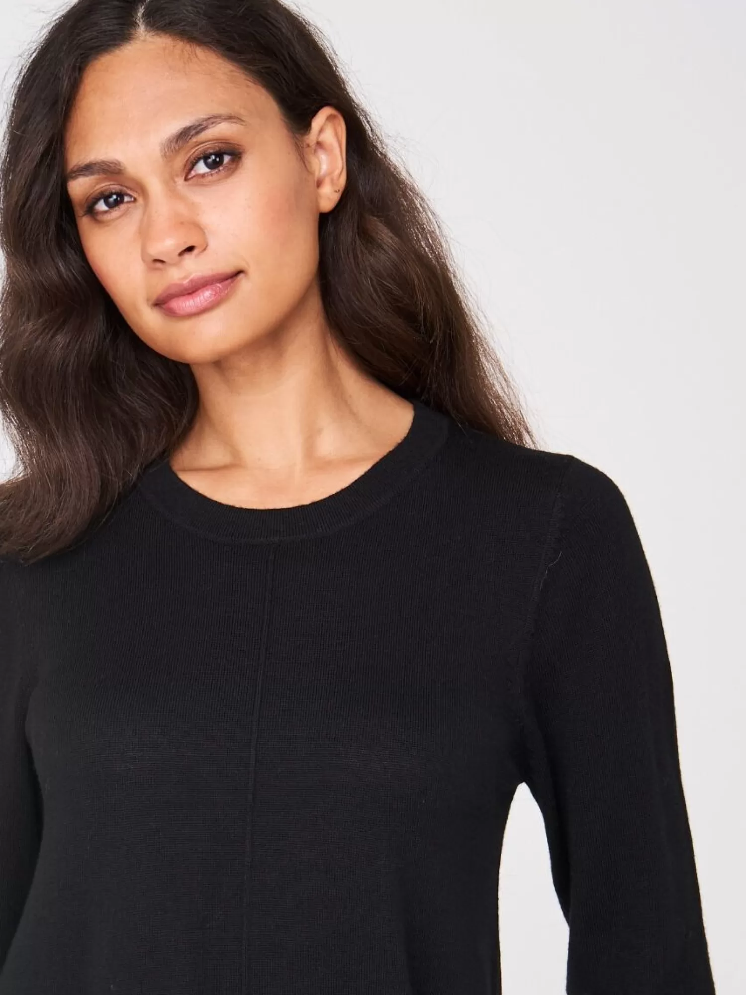 Robe trapèze en laine mérinos tricotée main - Collection élégante et décontractée pour femme  

(Note : J'ai utilisé des formulations courantes dans les descriptions de mode française, intégré des termes de valorisation comme 